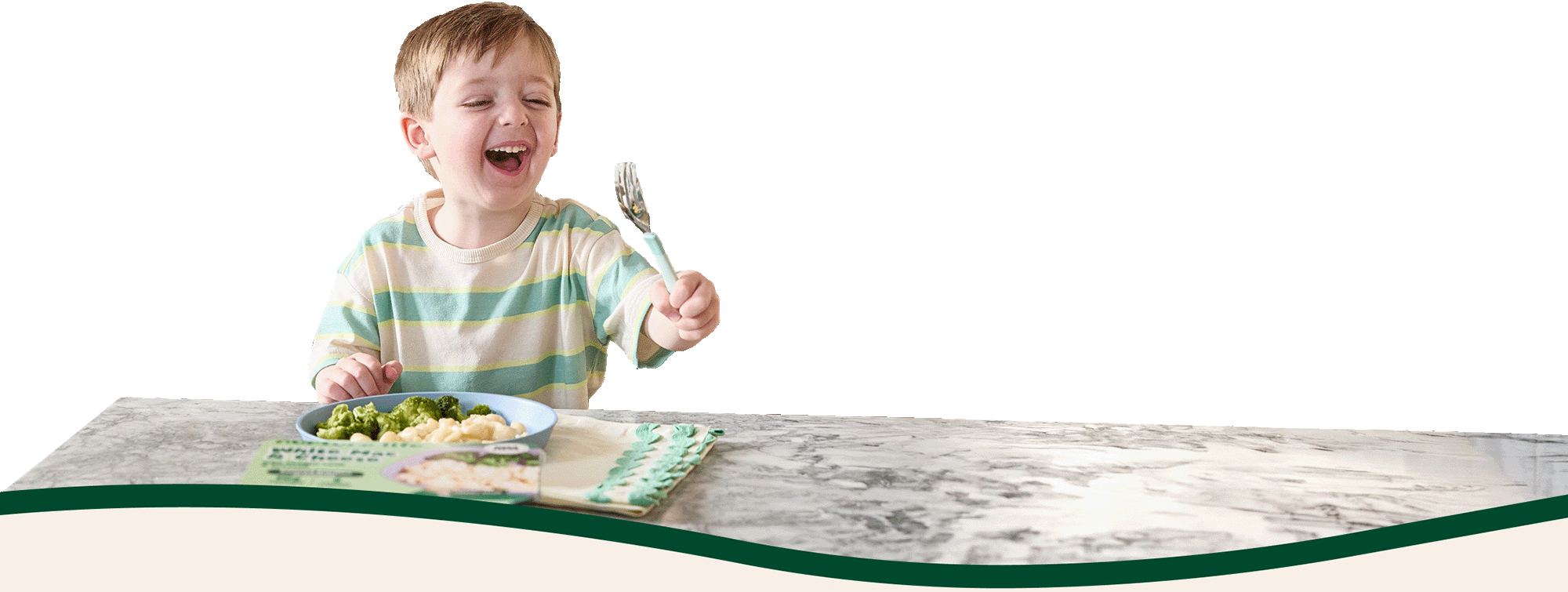 Happy kid eating Nurture Life meal