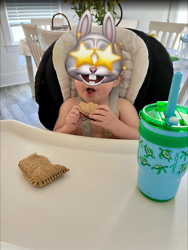 Photo of a toddler eating a Super Sammie